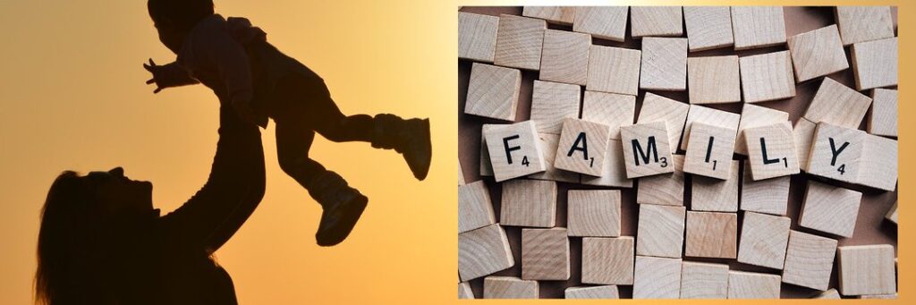 Mother holding child happy in the air. Scrabble letters spelling "family". 